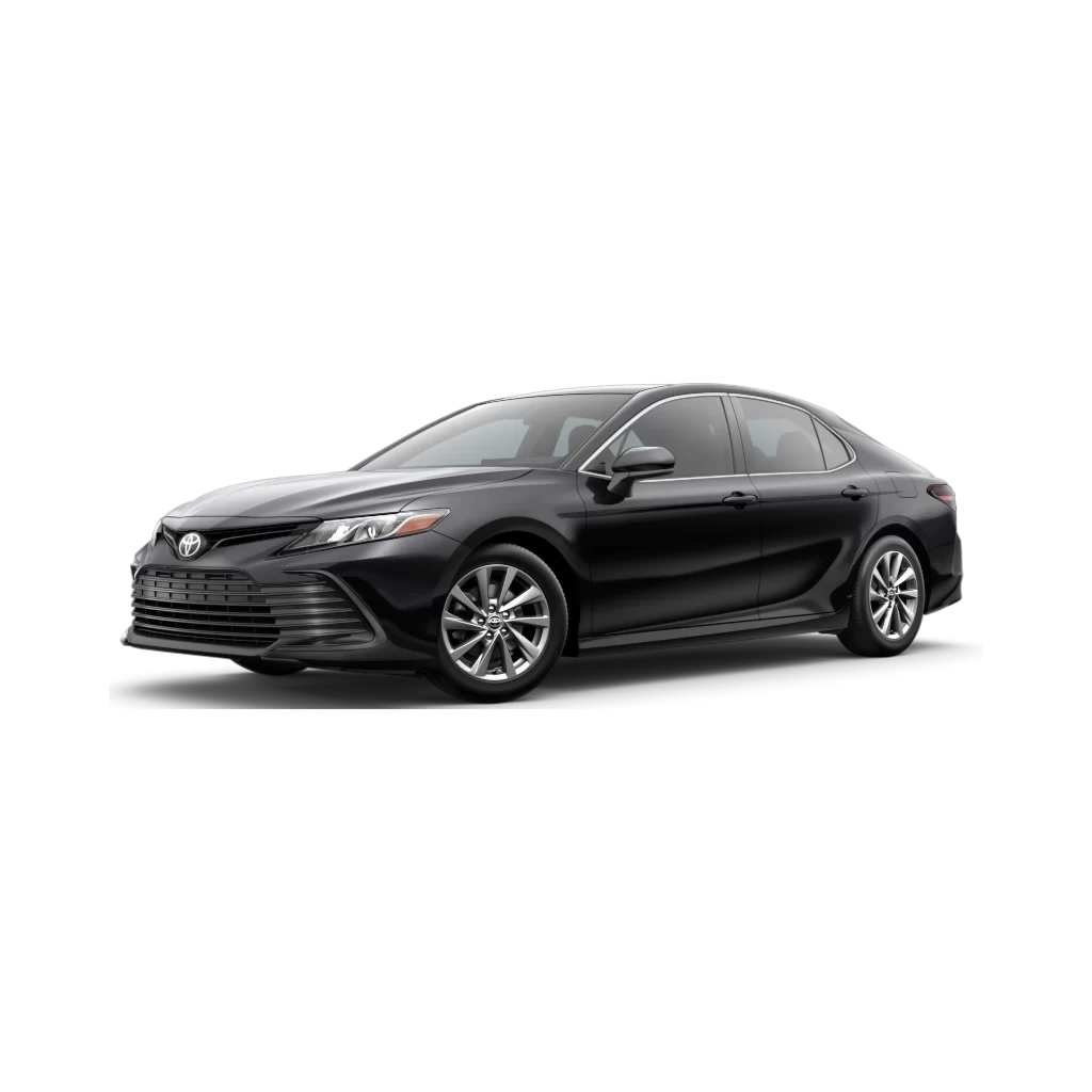 Chauffeured Toyota Camry car rental service, sleek and comfortable in urban surroundings