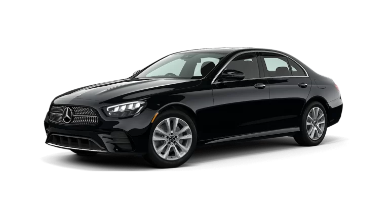 A Benz E-Class sedan with a chauffeur, offering luxury transportation for business trips, airport transfers, and VIP clients in Bangkok