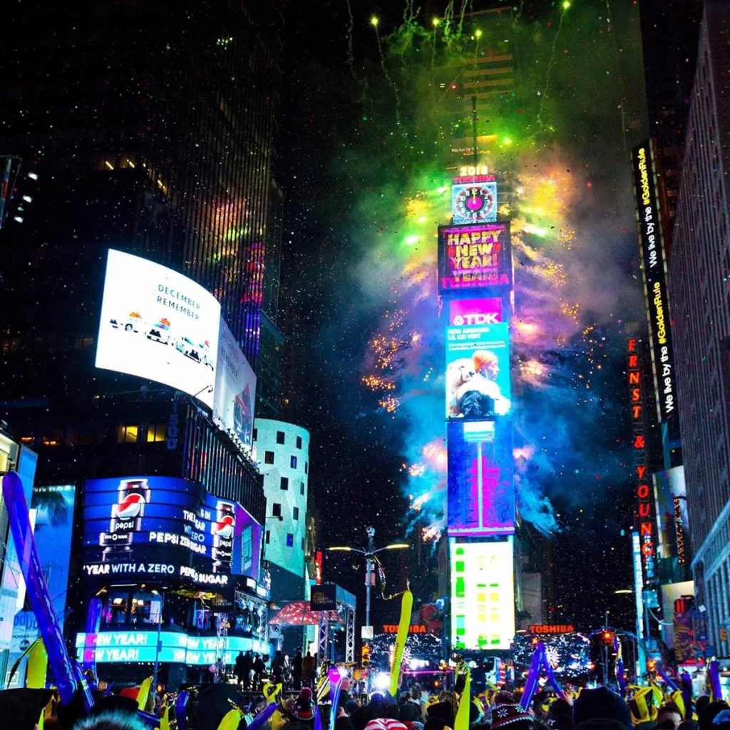 Colorful street parade during a major festival in December.