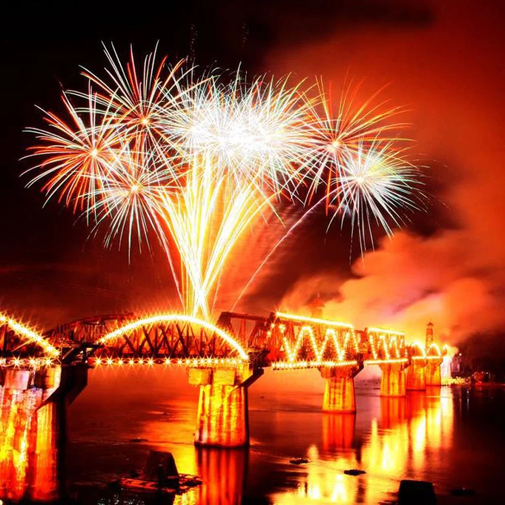 Fireworks light up the night sky above the River Kwai Bridge during a festive celebration in Kanchanaburi, Thailand.