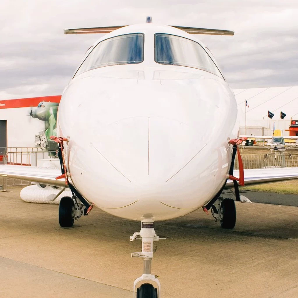 Front view of a Cessna Citation X private jet parked on the tarmac