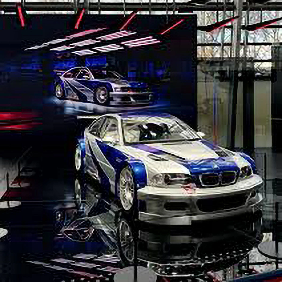 BMW M3 GTR on display at BMW Welt, a silver-and-blue car from Need for Speed: Most Wanted.