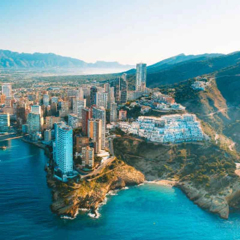 Aerial view of Benidorm, a vibrant city with stunning beaches and tall skyscrapers, located in Costa Blanca, Spain