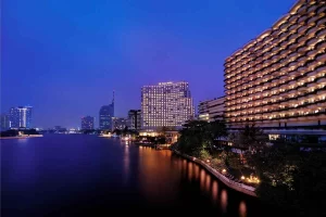 Shangri-La Bangkok, a 5-star luxury hotel located on the banks of the Chao Phraya River, offering breathtaking river views, a world-class spa, and renowned dining experiences.