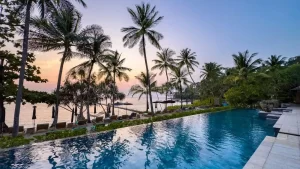 A luxurious private pool villa at Trisara Phuket with panoramic ocean views and lush greenery