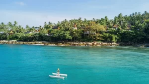 A luxurious beachfront pavilion villa at Amanpuri, offering panoramic views of Pansea Beach and a private infinity pool