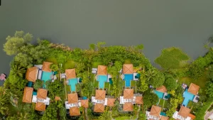 A serene private pool villa at Banyan Tree Phuket, nestled within lush greenery and overlooking a tranquil lagoon