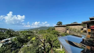 A stunning treetop pool villa at Keemala Phuket, surrounded by lush rainforest with a private infinity pool