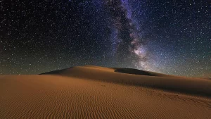 The Gobi Desert at night, with a stunning view of sand dunes under the Milky Way